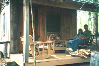 Guests enjoy swing on front porch.